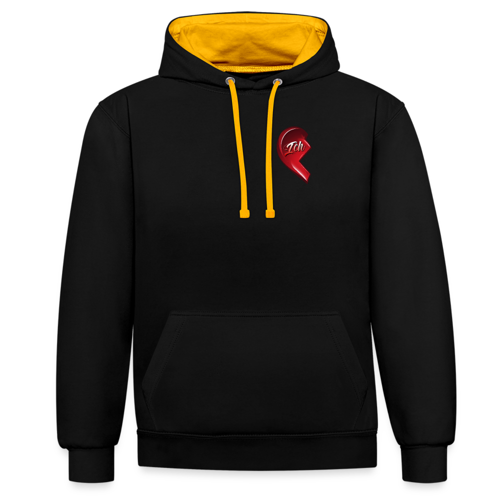 Schwarz/Gold Streetwear Hoodie im 2-Farben-Design mit farbiger Kapuze und Kordeln. Herz-Motiv auf der linken Brust – Ideal als Valentinstag Geschenk für Freund und Freundin.