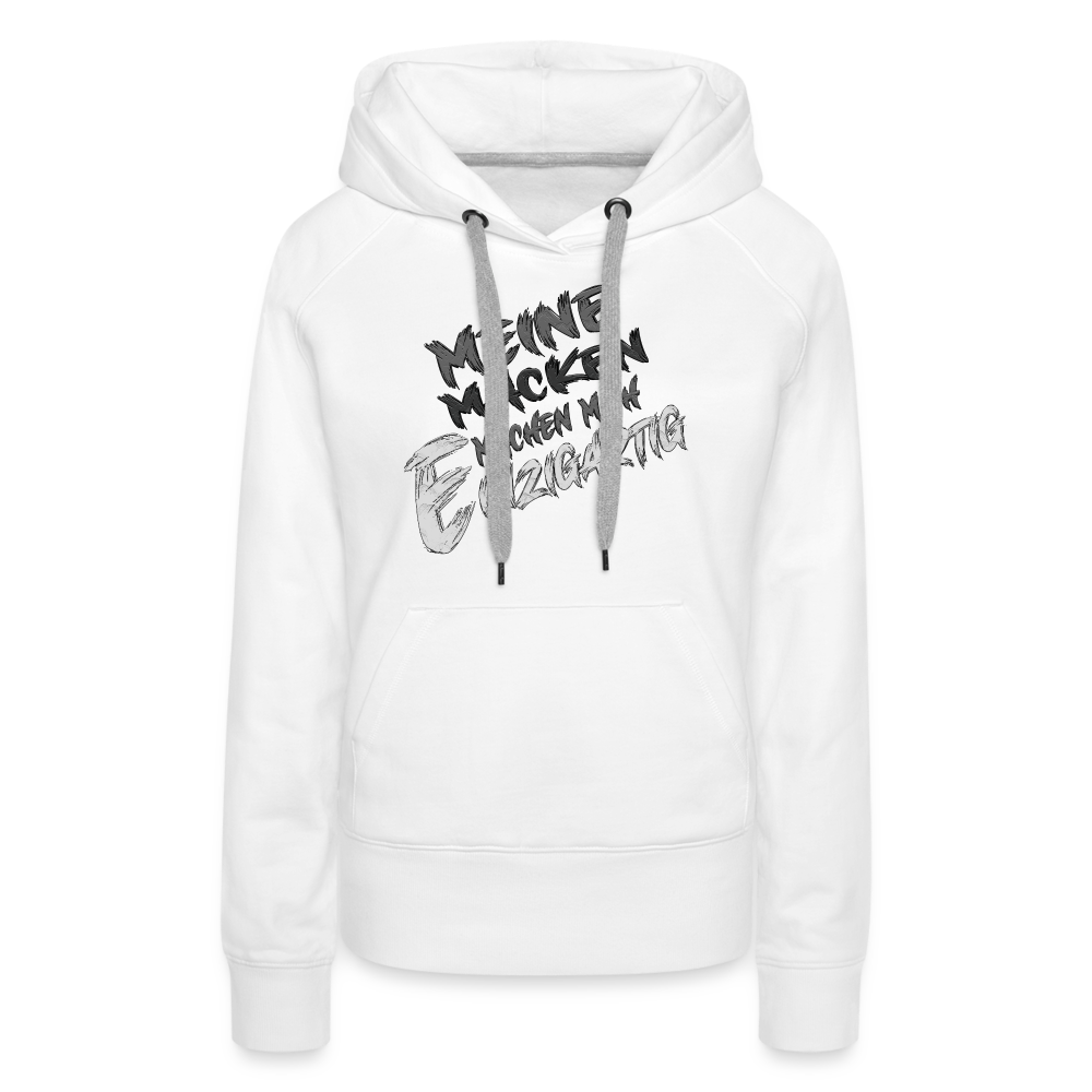 Weißer Streetwear Hoodie für Frauen mit dem humorvollen Statement „Meine Macken machen mich einzigartig“. Modernes Design mit weißer und schwarzer Schrift in kreativer Typografie auf der Vorderseite, kontrastfarbene Kapuzenbänder und praktische Kängurutasche. Perfekt für einen lässigen Look.