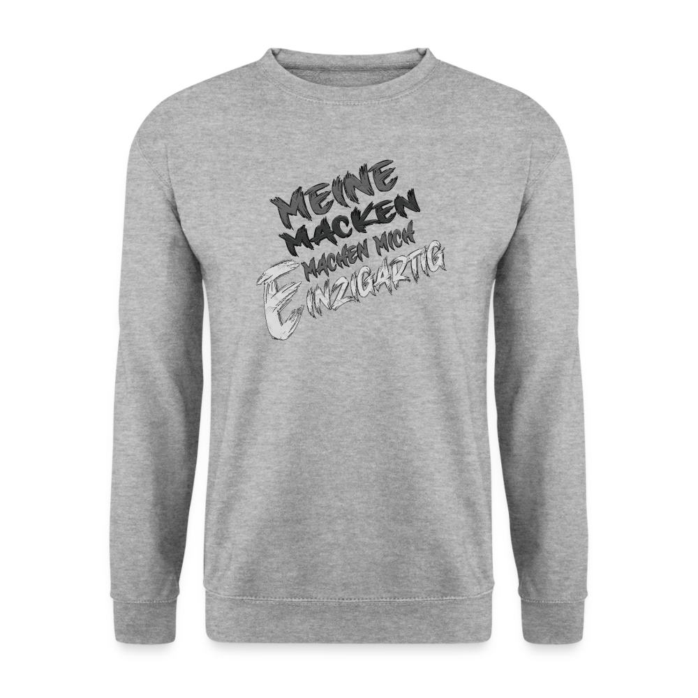 Weißgrau melierter Streetwear Pullover für Frauen und Männer mit einzigartigem Statement Spruch auf der Brust „Meine Macken machen mich magisch“. Ideal für Freizeit und Alltag . Modisches Design. Klassischer Schnitt und Humor.